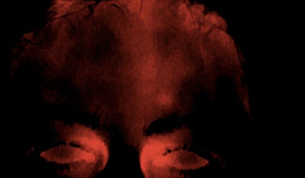 Infrared image of the forehead and prefrontal cortex after neurofeedback session 1, with dim, uneven color